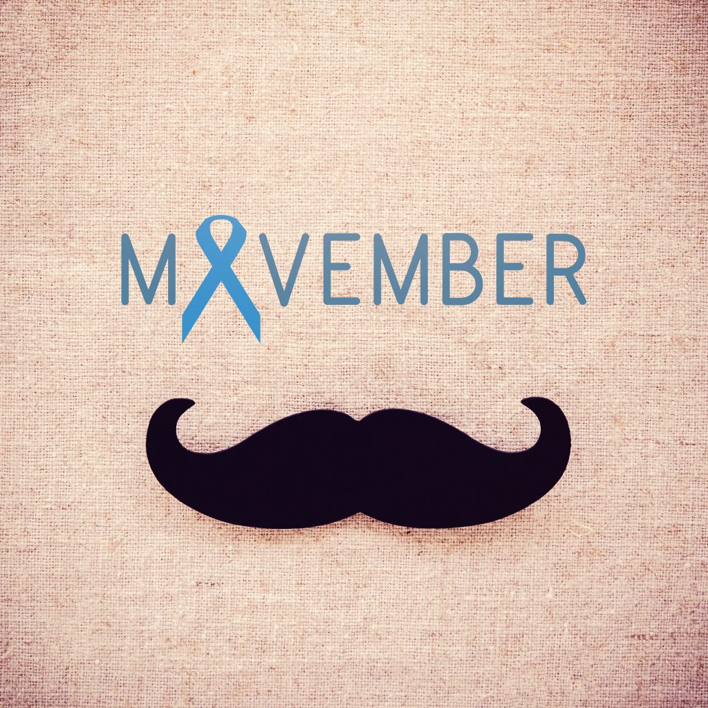Paper Mustache and Movember on fabric toning background, Prostate cancer awareness , Men health awareness month